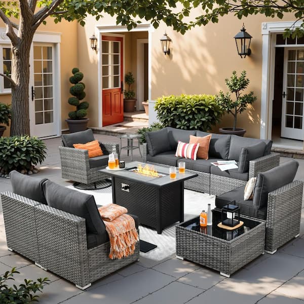 Sanibel Gray 10-Piece Wicker Patio Conversation Sofa Set with a Swivel Chair, a Metal Fire Pit and Black Cushions
