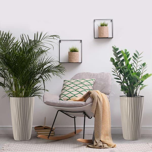 https://images.thdstatic.com/productImages/c6e59b17-0a59-4924-818e-005b4f828334/svn/beige-plant-pots-et-4800b-c3_600.jpg