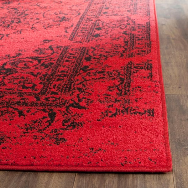 https://images.thdstatic.com/productImages/c6f0bf91-7d74-4a28-9b4f-402846acea72/svn/red-black-safavieh-area-rugs-adr101f-8sq-4f_600.jpg