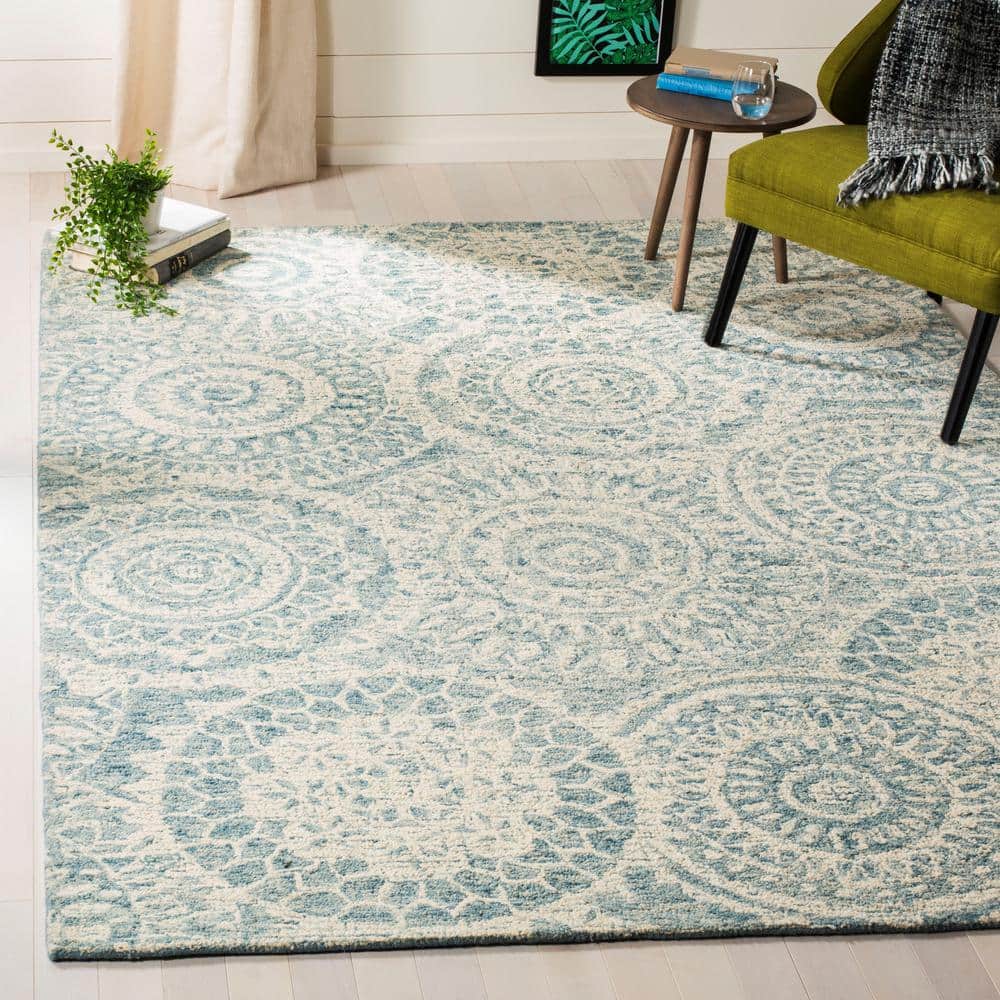 Ivory Abstract Tufted Wool 10' x 14' Rectangular Area Rug
