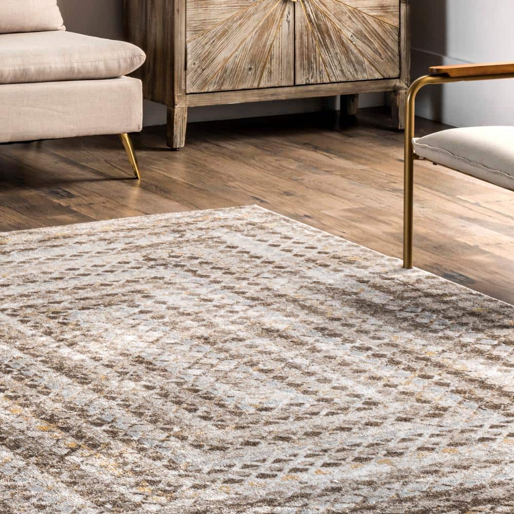Beige and Ivory Geometric 4' x 6' Washable Synthetic Area Rug