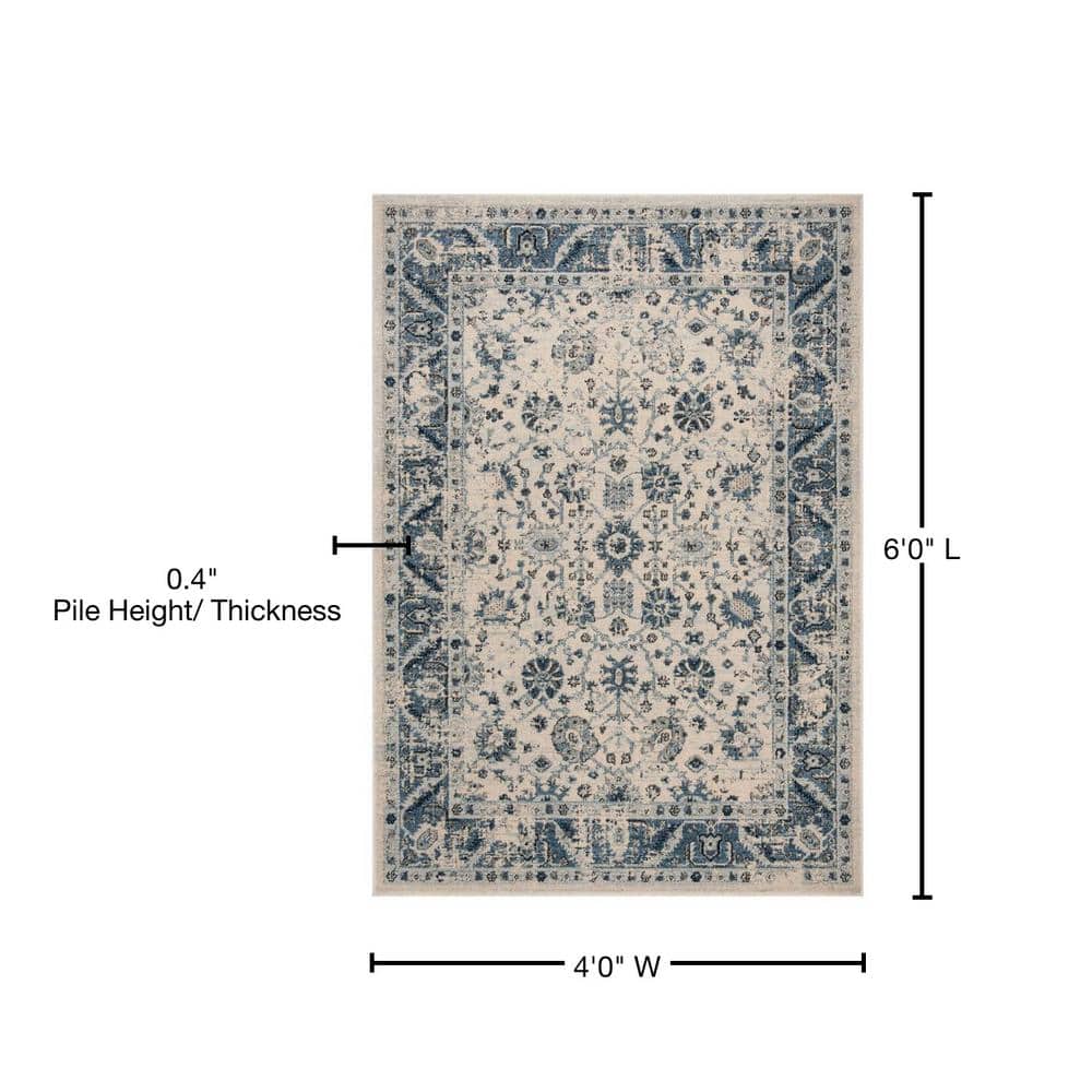 Ivory and Blue 4' x 6' Synthetic Rectangular Area Rug