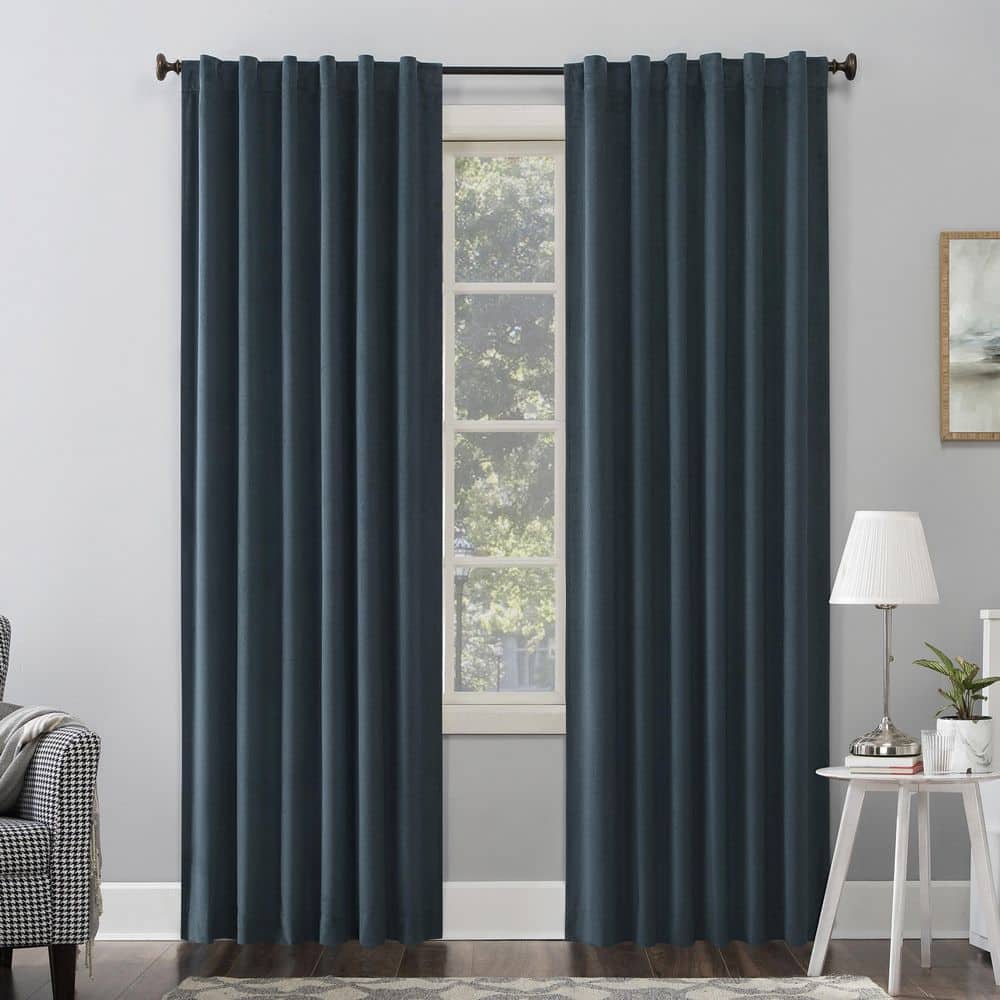 https://images.thdstatic.com/productImages/c7272dc5-f05b-5414-914e-e9cf068ed405/svn/teal-sun-zero-blackout-curtains-56596-64_1000.jpg