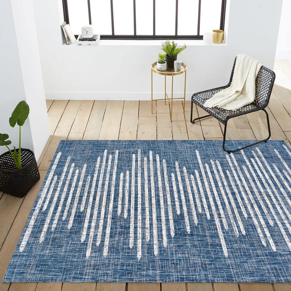 Bohemian Stripe Blue and Ivory Synthetic Area Rug 5' x 8'
