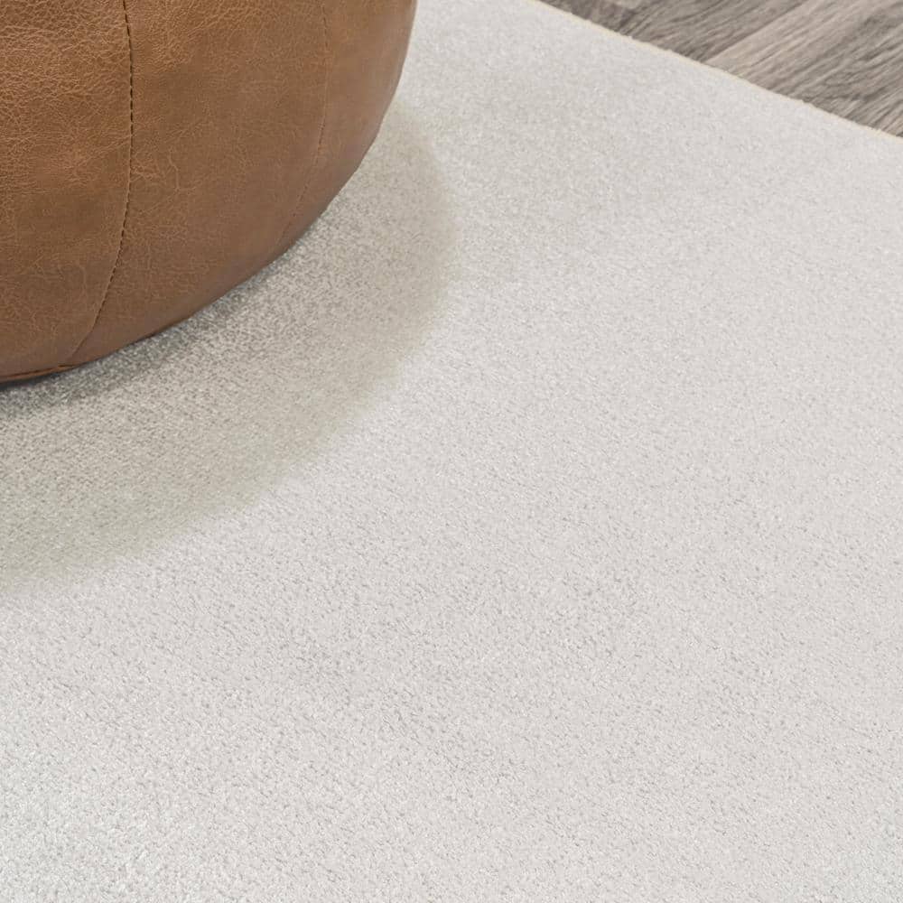 Cream 4' x 6' Synthetic Washable Rectangular Area Rug
