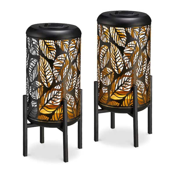 Glitzhome 14.25 in. H Black and Gold Metal Cutout Leaves Pattern Solar Powered LED Outdoor Lantern with Stand (set of 2)