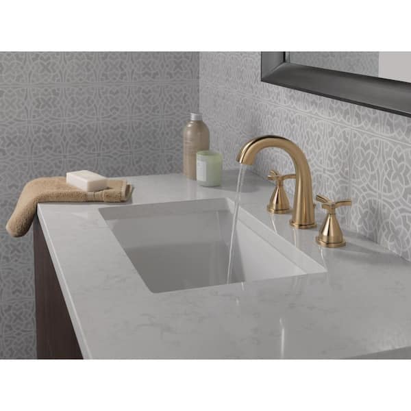 Stryke 8 in. Widespread 2-Handle Bathroom Faucet with Metal Drain Assembly in Champagne Bronze