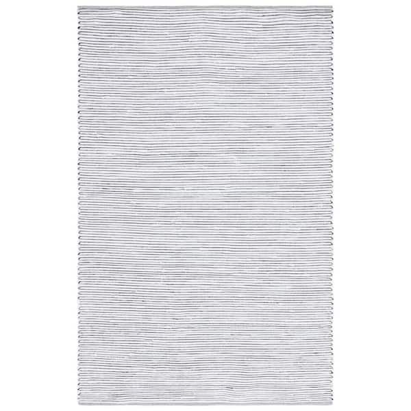 SAFAVIEH Montauk Navy/Ivory 8 ft. x 10 ft. Solid Color Striped Area Rug