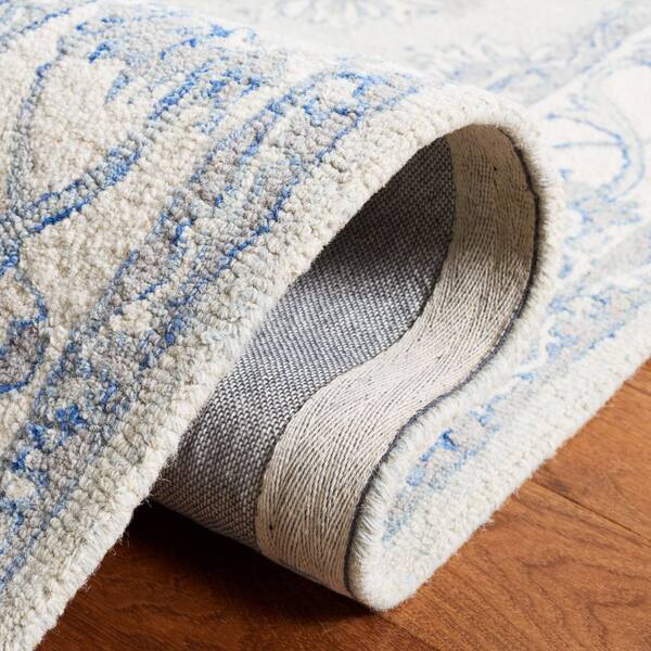 SAFAVIEH Micro-Loop Light Blue/Ivory 8 ft. x 10 ft. Border