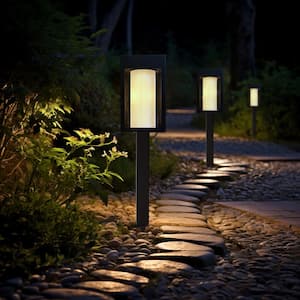 Black Integrated LED Outdoor Solar Pathway Lights with Outer Clear and Inner Frosted Glass (4-Pack)