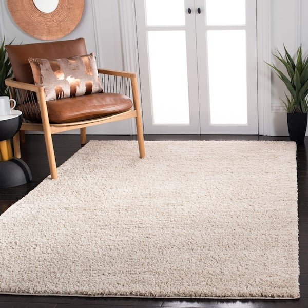 August Shag 8 ft. x 10 ft. Beige Solid Color Area Rug