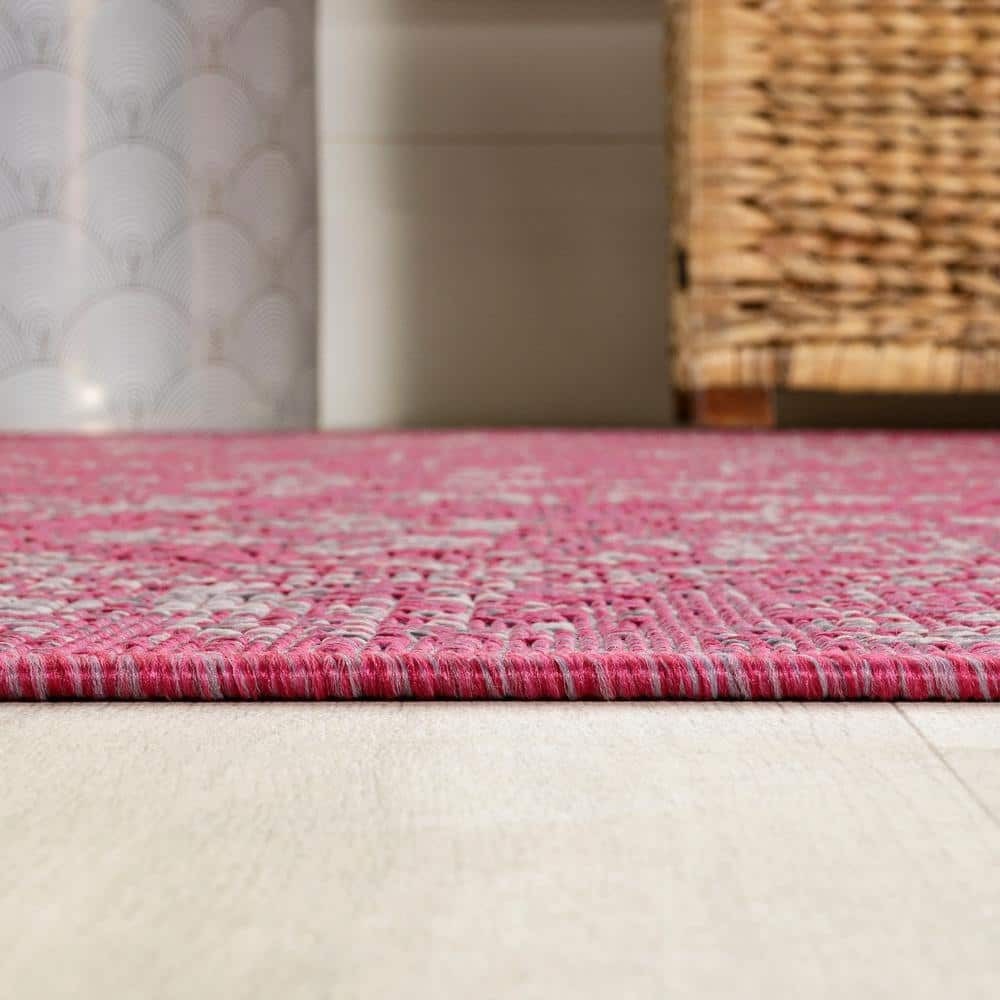 9' x 12' Fuchsia and Light Gray Floral Synthetic Area Rug
