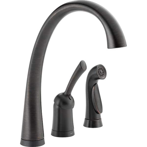 Delta Pilar Waterfall Single-Handle Standard Kitchen Faucet with Side Sprayer and Touch2O Technology in Venetian Bronze