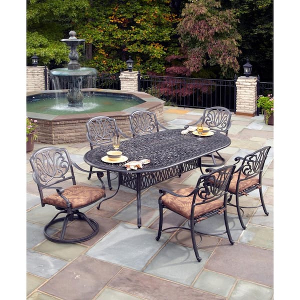 HOMESTYLES Capri Charcoal Gray 7-Piece Cast Aluminum Oval Outdoor Dining Set with Burnt Sierra Orange Cushions