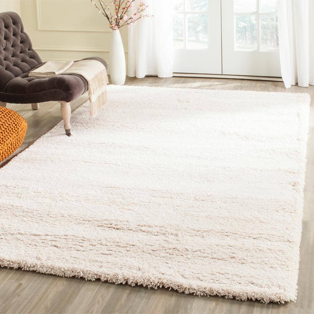 Ivory 8' x 10' Reversible Solid Shag Synthetic Rug