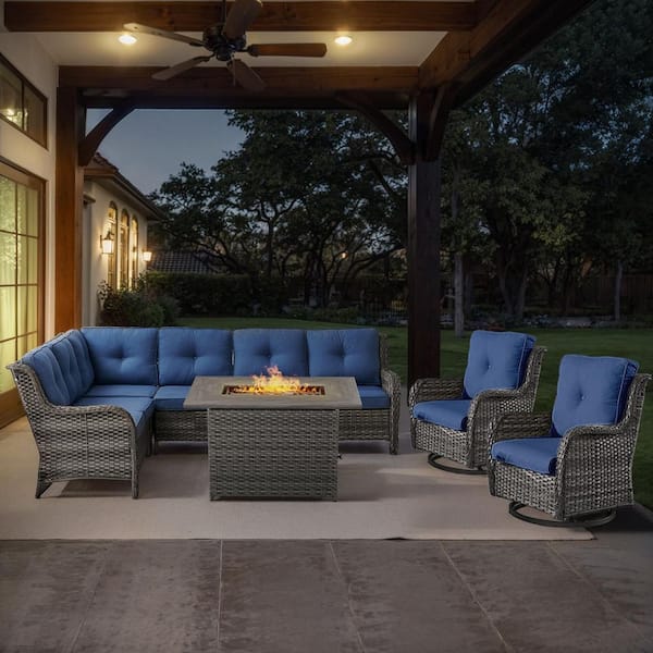 Gray 4-Piece Wicker Patio Fire Pit Set, Outdoor Sectional Seating Set with Olefin Navy Blue Cushions and Swivel Rockers