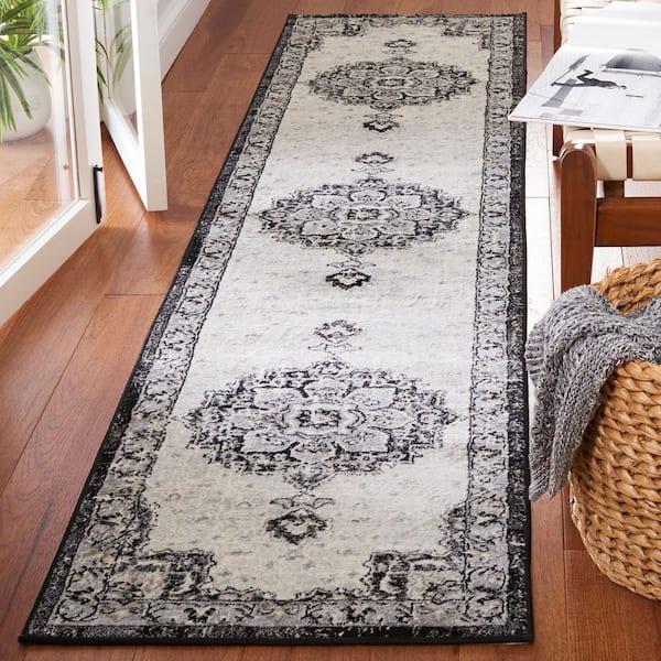 Brentwood 2 ft. x 9 ft. Black/Ivory Ornate Medallion Runner Rug