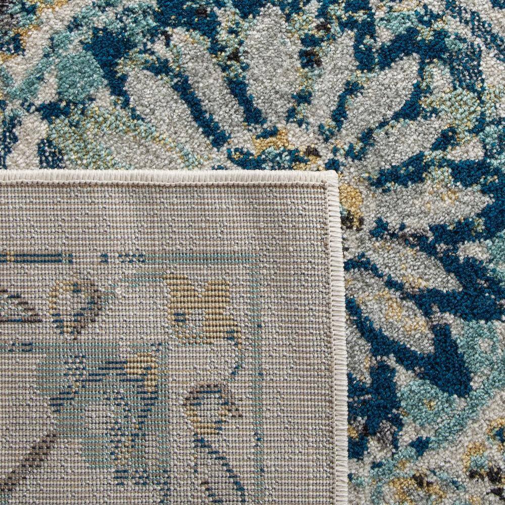 Ivory and Blue Floral Motif Synthetic Area Rug