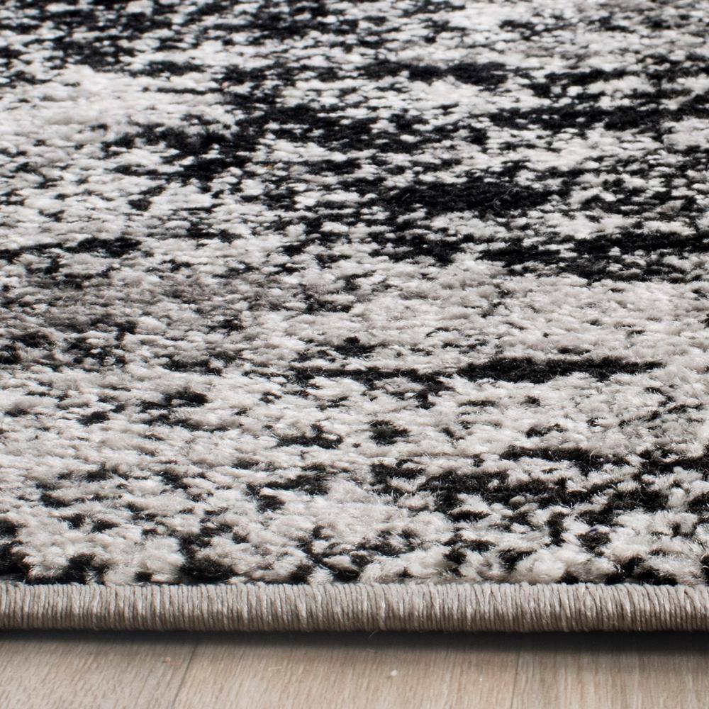 Selwyn Abstract Silver Multicolor 8' x 10' Easy-Care Area Rug