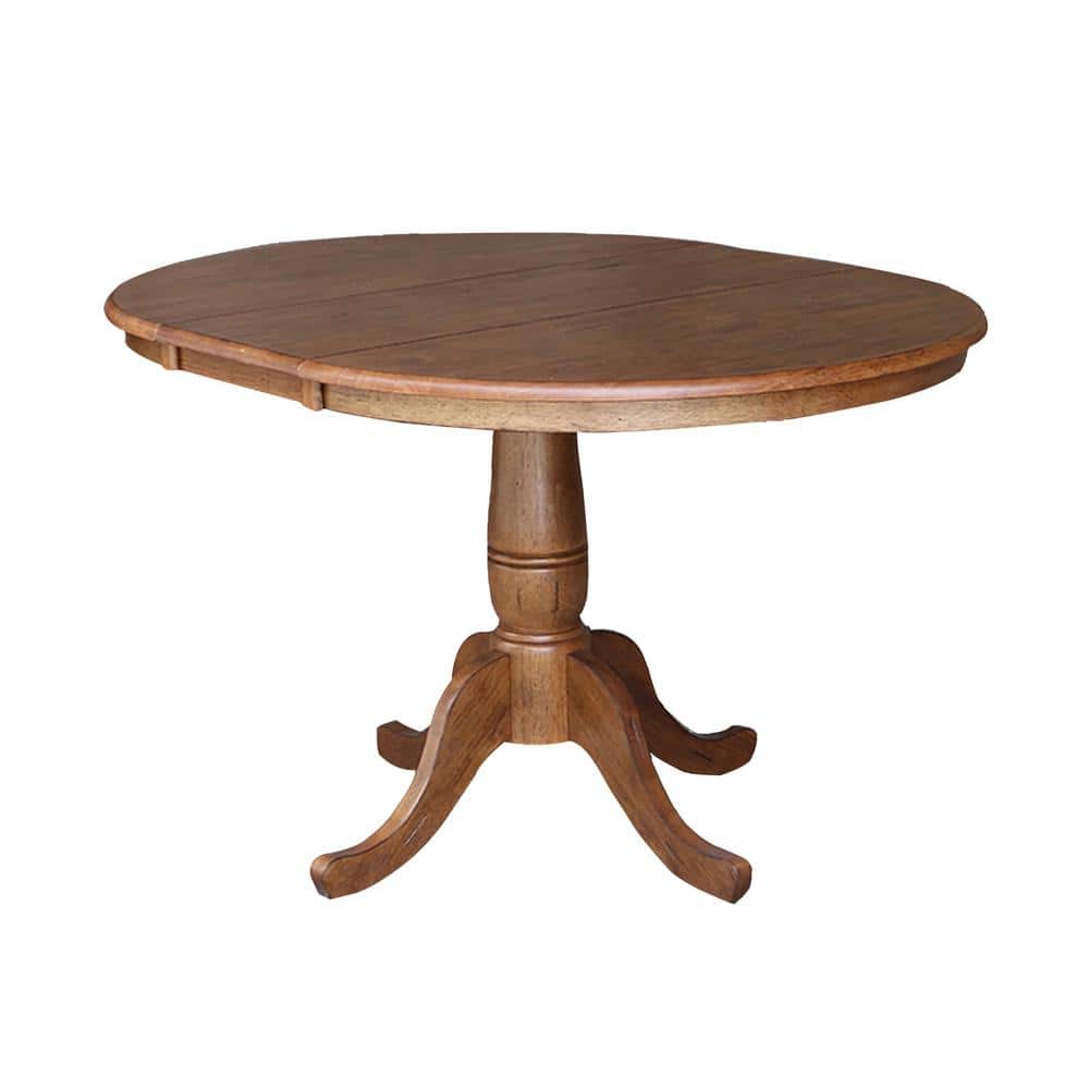 Elegant Round Oak Extendable Dining Table with Drop Leaf