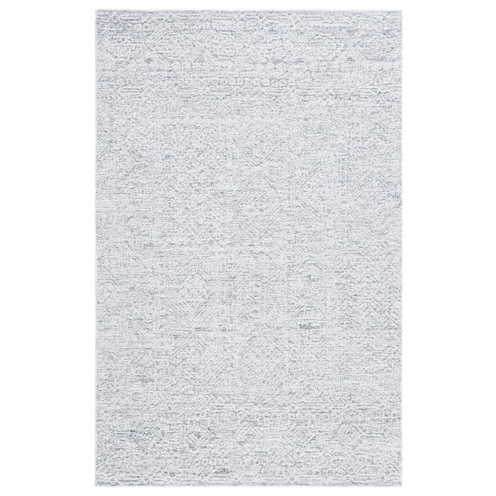 Ivory Hand Tufted Wool and Synthetic Area Rug