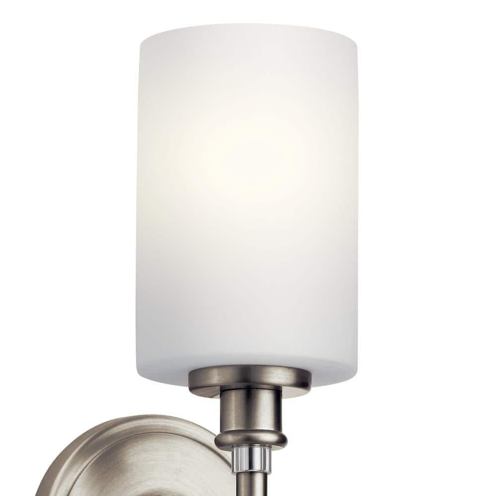 Transitional Nickel Wall Sconce with Cream Cylinder Shade