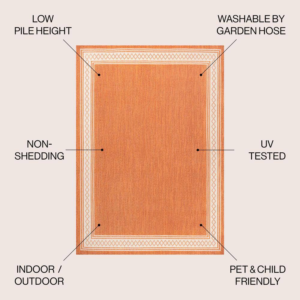 Lucia Cream and Orange Synthetic Indoor/Outdoor Area Rug