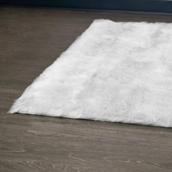 Auriel White 5 ft. x 7 ft. Faux Sheepskin Fur Rectangular Area Rug