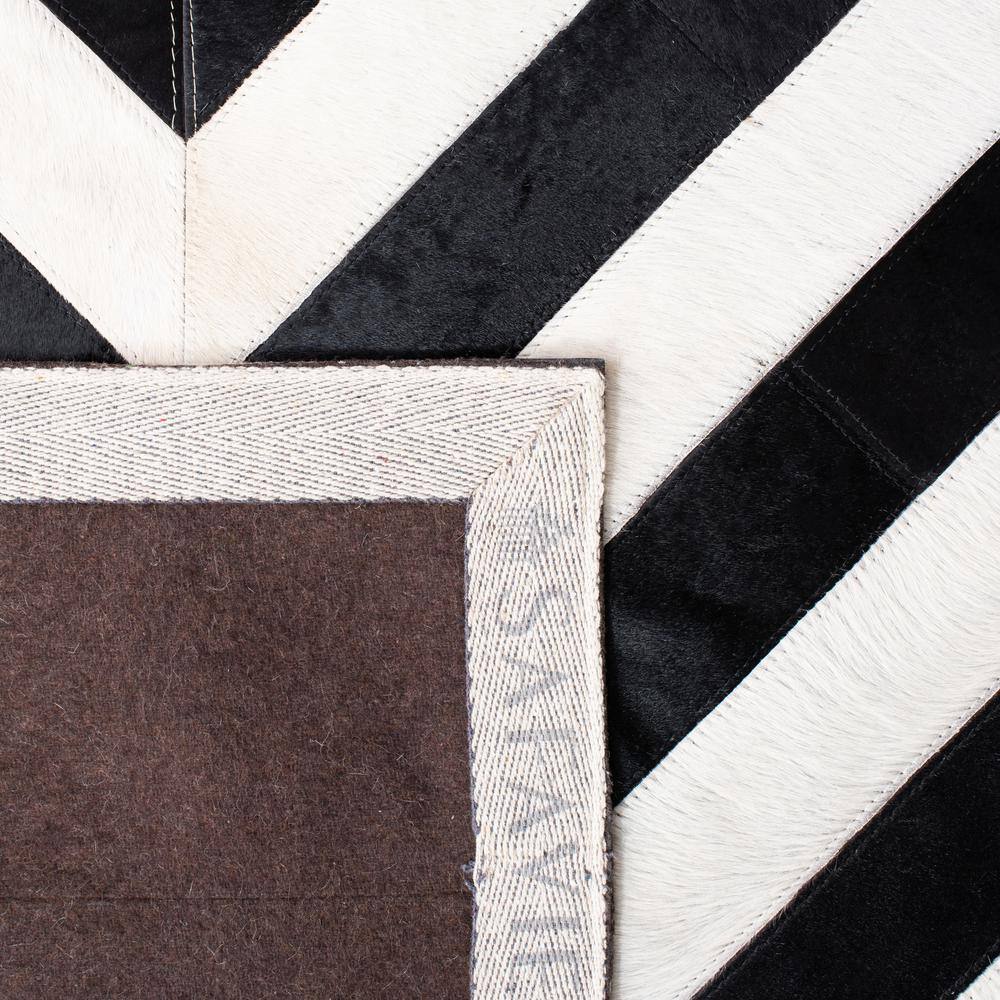 Hand-Knotted Geometric Black and White Cowhide Area Rug 5' x 8'