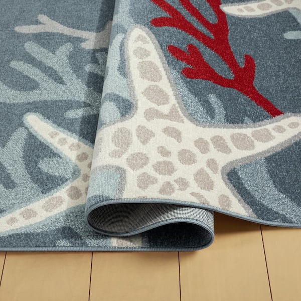 https://images.thdstatic.com/productImages/c814adef-21bc-4a19-a000-f378bb700828/svn/navy-blue-ivory-home-dynamix-outdoor-rugs-1-18386-300-1f_600.jpg