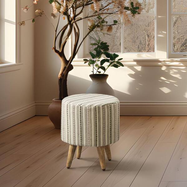 OSP Home Furnishings Boho Style Woven Cotton Striped Round Accent Ottoman with Natural Finish Legs