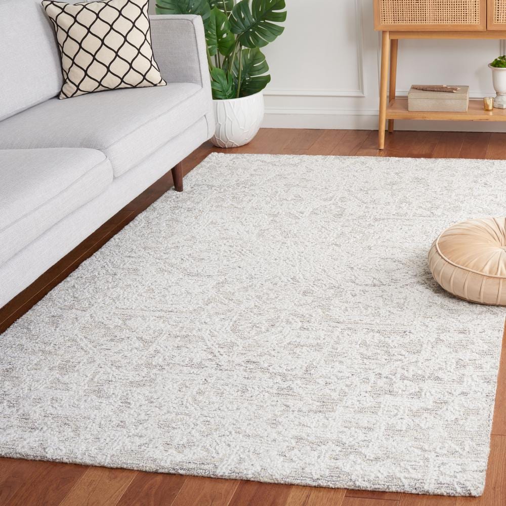 Ivory and Silver 8' x 10' Tufted Wool Area Rug