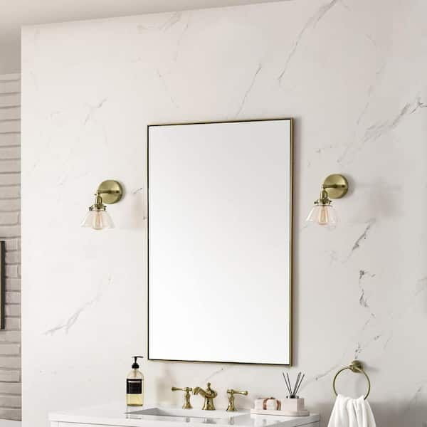 https://images.thdstatic.com/productImages/c826685e-a83e-5cf0-ac75-88d6c4feb5e9/svn/champagne-brass-james-martin-vanities-vanity-mirrors-715-m26-cb-4f_600.jpg