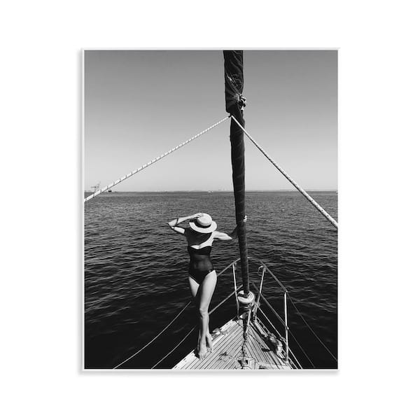 Stupell Industries Woman Posing on Boat by LSR Design Studio Unframed People Graphic Art Print 14 in. x 11 in.