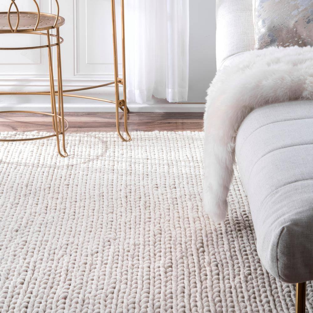 Off-White Braided Wool 6' x 9' Area Rug