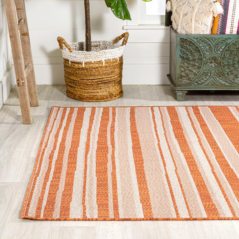 Castara Chic Orange & Cream Striped Synthetic 5x8 Area Rug