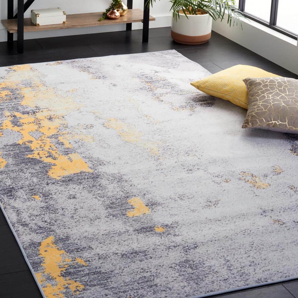 Tacoma 4' x 6' Gray and Gold Synthetic Area Rug