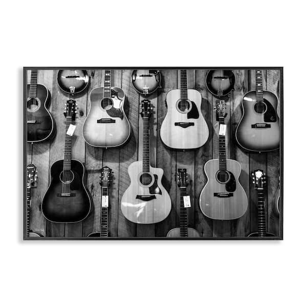 Stupell Industries Acoustic Guitars Hanging by Jennifer Rigsby Black Framed Music Giclee Art Print 20 in. x 30 in.