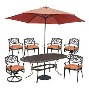 Sanibel Rust Bronze 9-Piece Cast Aluminium Oval Outdoor Dining Set with Orange Coral Cushions Umbrella