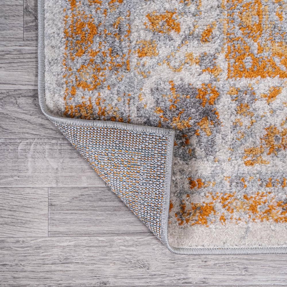 Indhira Orange and Cream Medallion 9' x 12' Synthetic Area Rug