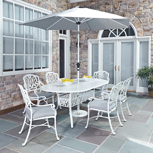 HOMESTYLES Capri White 9-Piece Cast Aluminum Oval Outdoor Dining Set with Umbrella with Gray Cushions