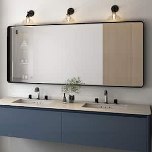65 in. W x 22 in. H Rectangular Aluminum Framed Wall Bathroom Vanity Mirror in Black