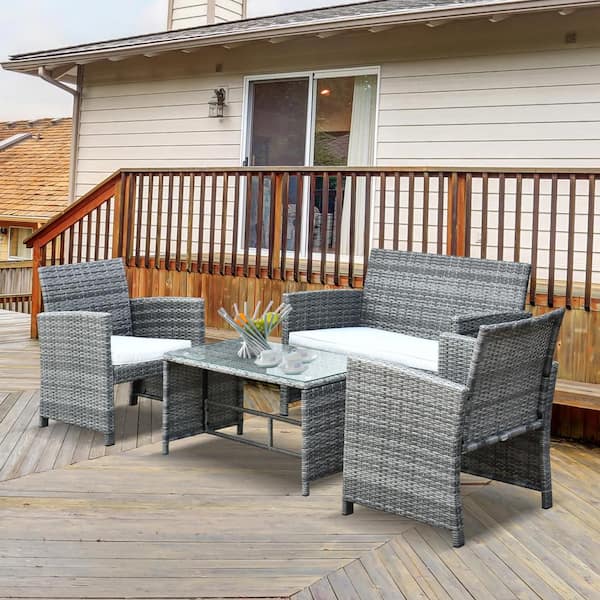 Outsunny 4-Piece Metal Plastic Rattan Patio Conversation Set with Beige Cushions, a Loveseat, 2 Chairs and Coffee Table