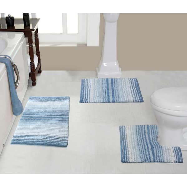 https://images.thdstatic.com/productImages/c87e1780-1985-44e5-900e-f2dbdfffdd3a/svn/blue-home-weavers-inc-bathroom-rugs-bath-mats-bgrd3pc172021bl-64_600.jpg