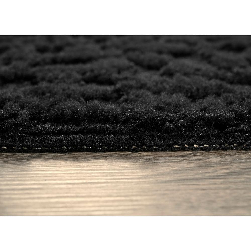 Ivy Collection 6' x 9' Tufted Black Synthetic Area Rug