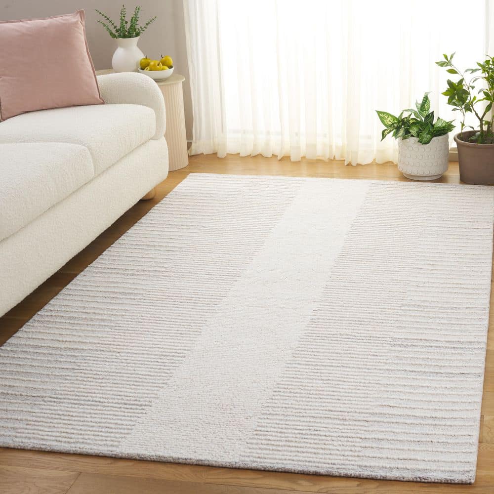 Abstract 5 ft. x 8 ft. Beige/Ivory Modern Solid Color Area Rug price history on PriceWatchPro