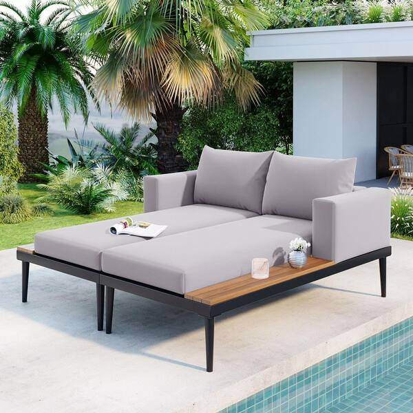 Unbranded Black Metal Outdoor Day Bed with Gray Cushions and Wood Topped Side Spaces