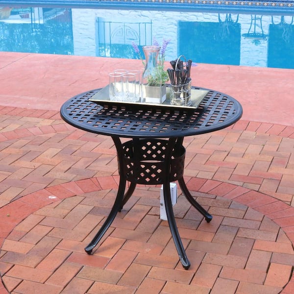 Round cast aluminum store patio table