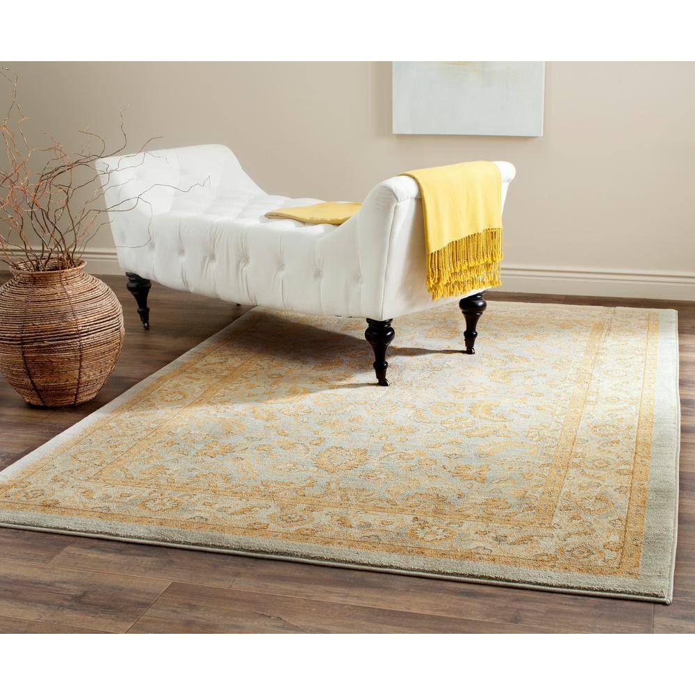 Light Blue and Gold Rectangular Synthetic Area Rug