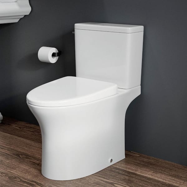 Rear Outlet Toilet 2-Piece with 16.5 in. White Elongated Bowl, 1.28 GPF Single Flush, 7 in. Rough-In, 2 Extension Pipes